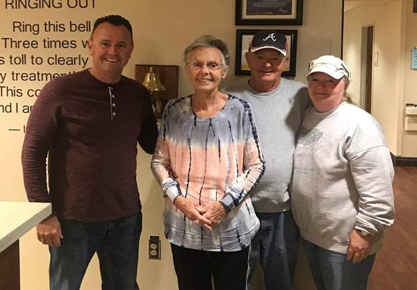 Andy with his parents and sister after his mother finished her cancer treatments in Asheville