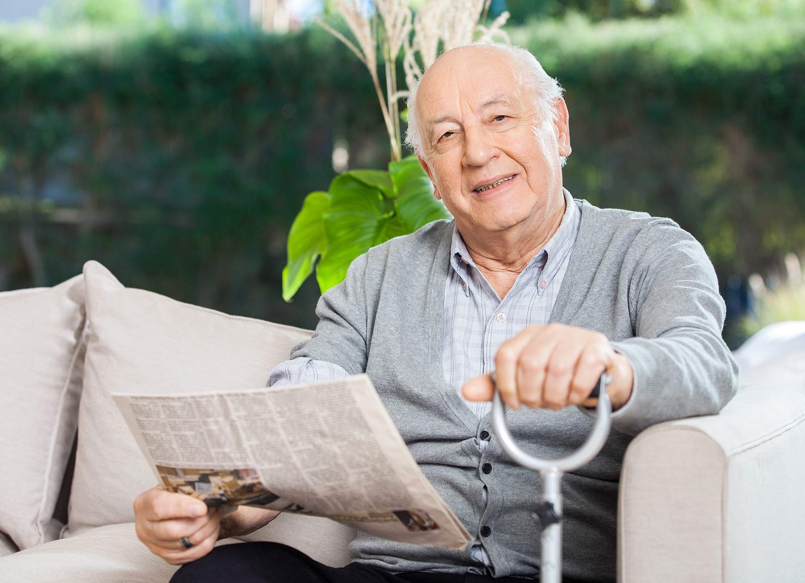 man reading newspaper