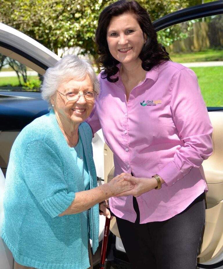 Elderly woman and aid