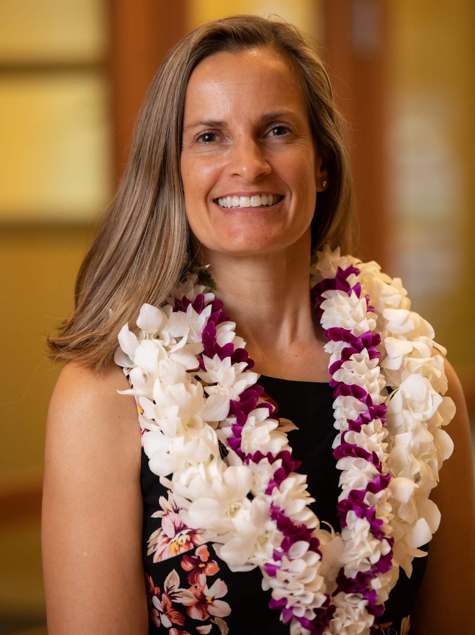 Owner wearing Lei