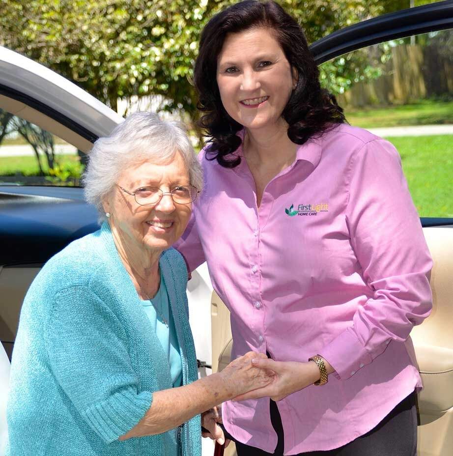 A Naperville caregiver helps a senior client