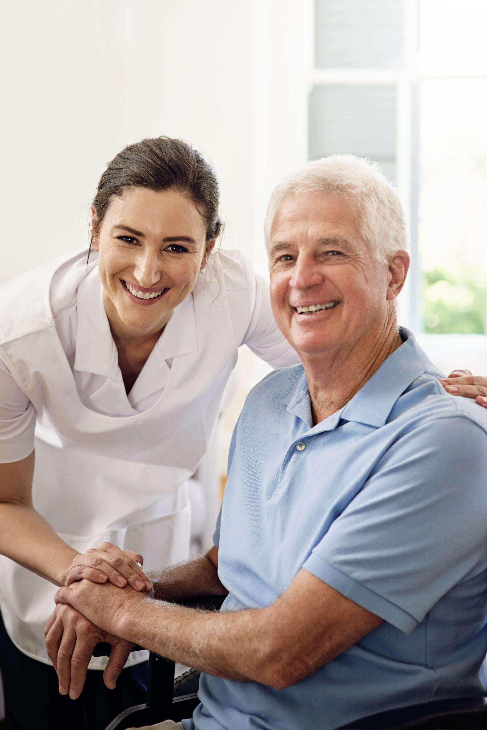 Elderly man receiving specialized care services at home