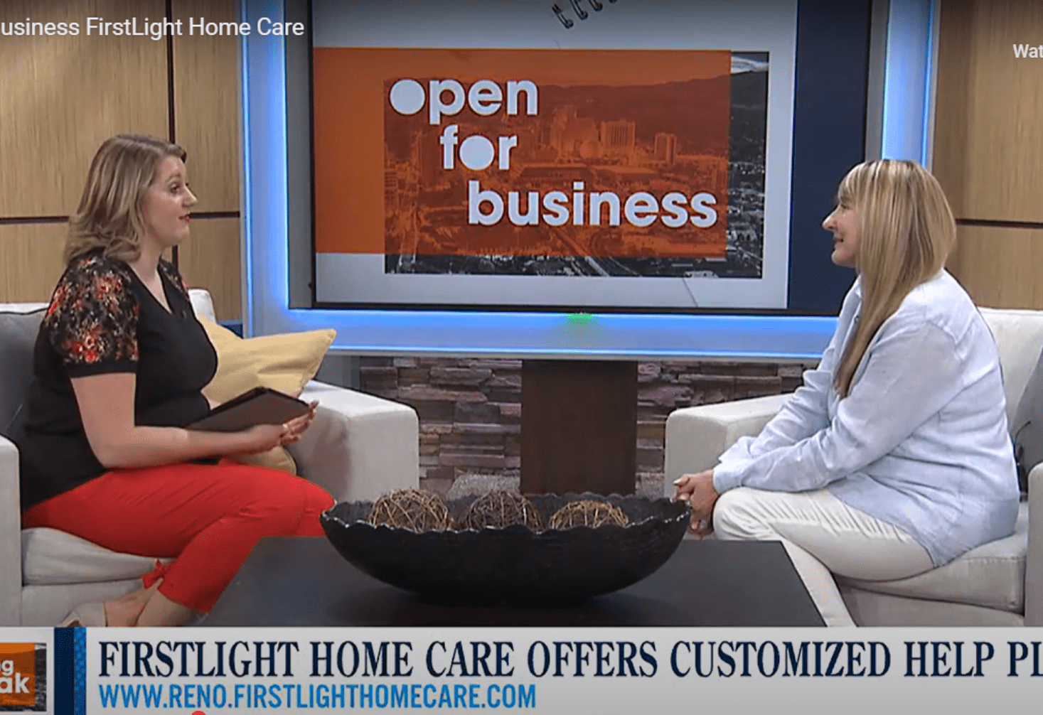 two women talking on a news show