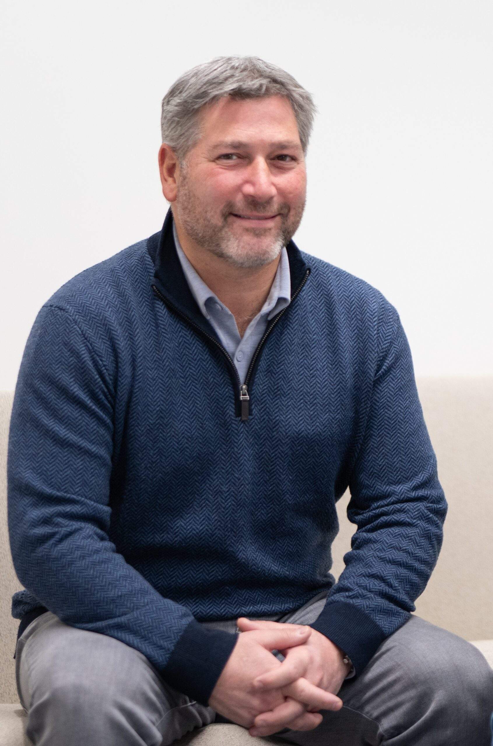 President and CEO Brian Epstein sitting and engaging, welcoming for for clients and caregivers