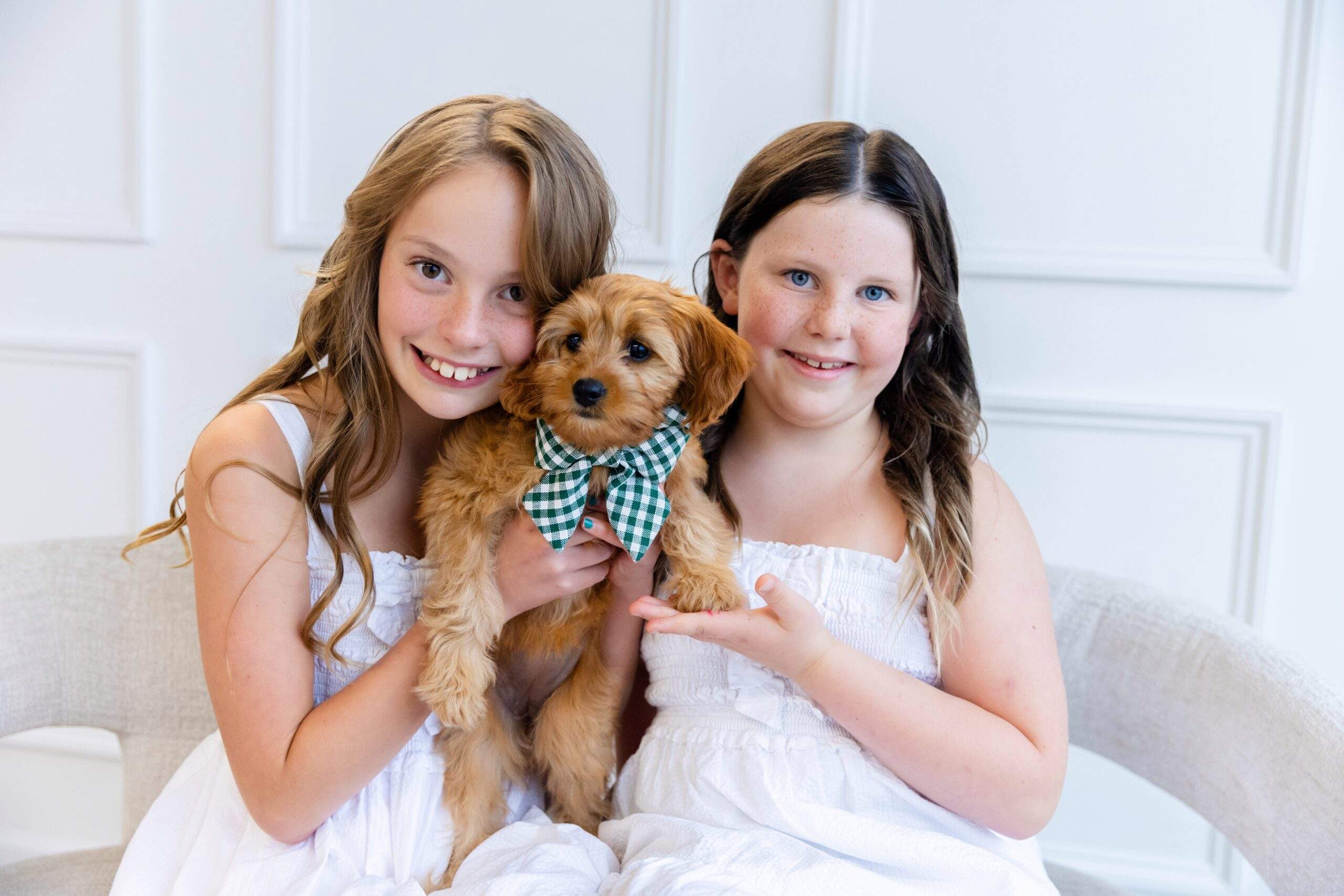 two little girls and dog