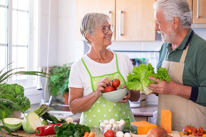older couple with produce