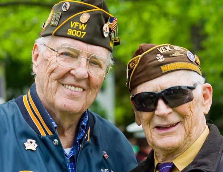 Two veterans from the Korean war stand side-by-side