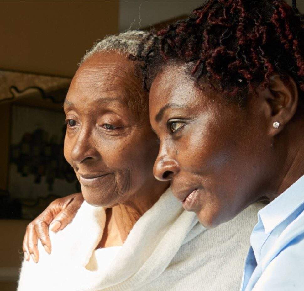 A caregiver and an elderly patient